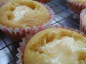 Soft, buttery, vanilla cupcakes. Combined with the cream cheese icing and filling, they make the perfect dessert. #recipe #cupcakes