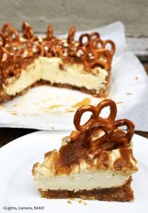 Salted Caramel Cheesecake is rich, creamy and sweet. This is a no bake salted caramel cheesecake with a digestive biscuit (Graham cracker) and salted pretzel crust with a homemade salted caramel sauce and salted caramel cheesecake filling. #saltedcaramelcheesecake #saltedcaramel #nobakecheesecake #nobakessaltedcaramelcheesecake