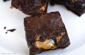 Peanut Butter Caramel Brownies: Rich and fudgy brownies filled with pockets of peanut butter and swirled with homemade caramel sauce. #peanutbutterbrownies #caramelbrownies #peanutbuttercaramel #peanutbrownies #fudgybrownies